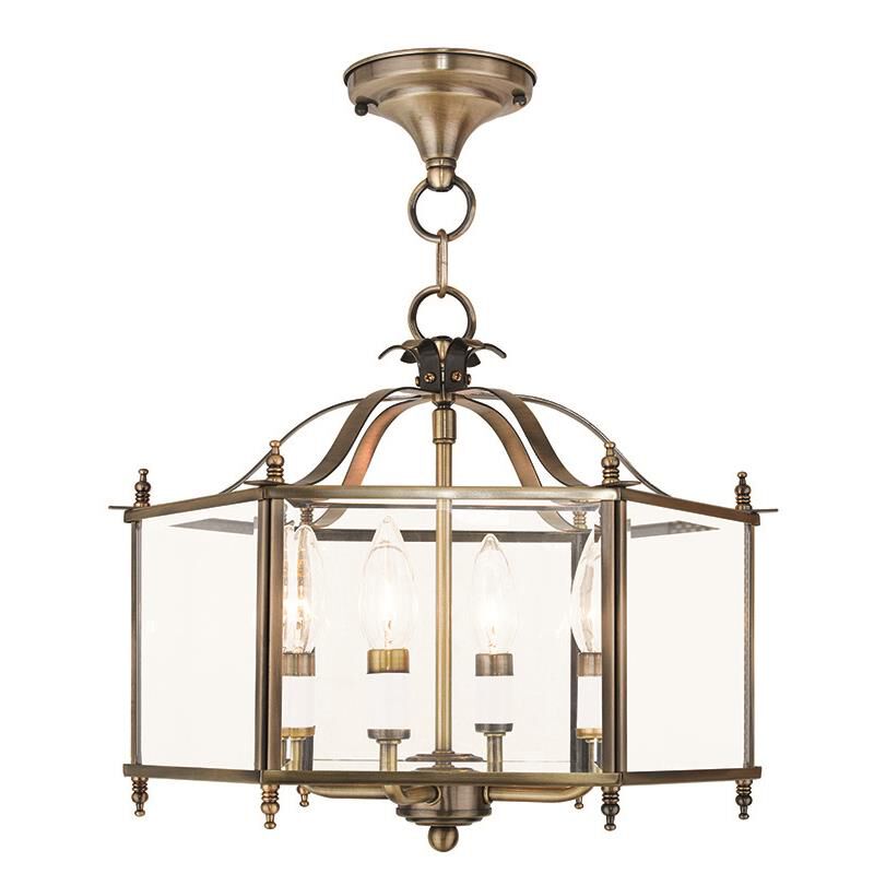 Shown in Antique Brass finish and Clear glass